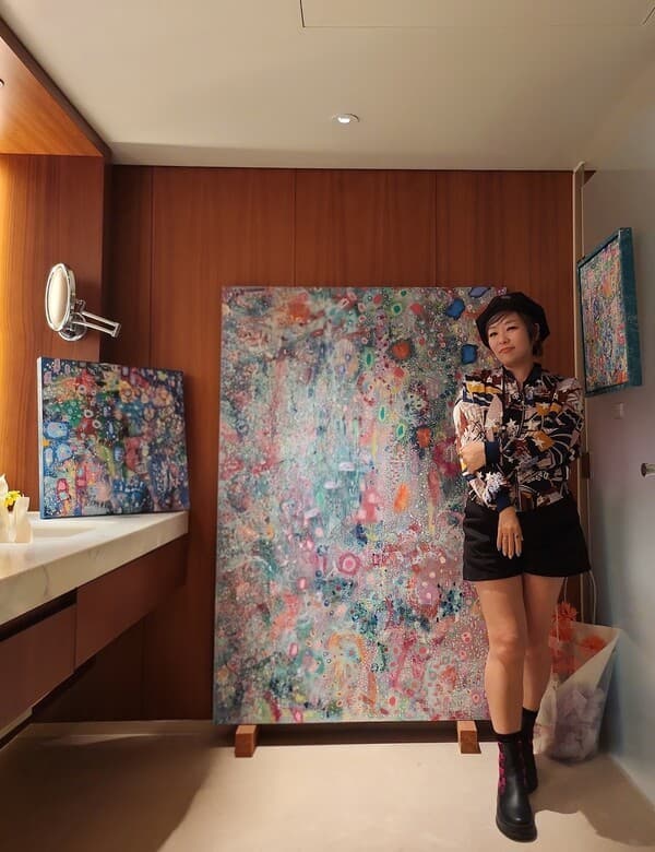 Artist Ichigo Se-yeon standing in front of her work [Photo: Ichigo]
